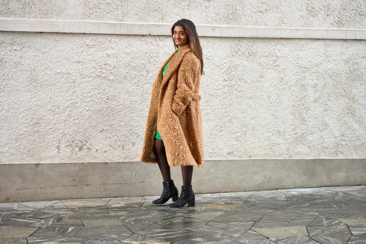 woman in statement coat