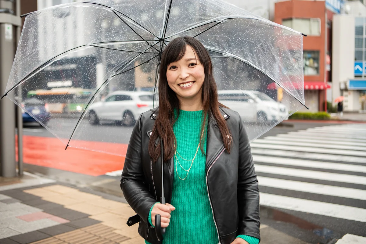 woman in leather jacket and sweater