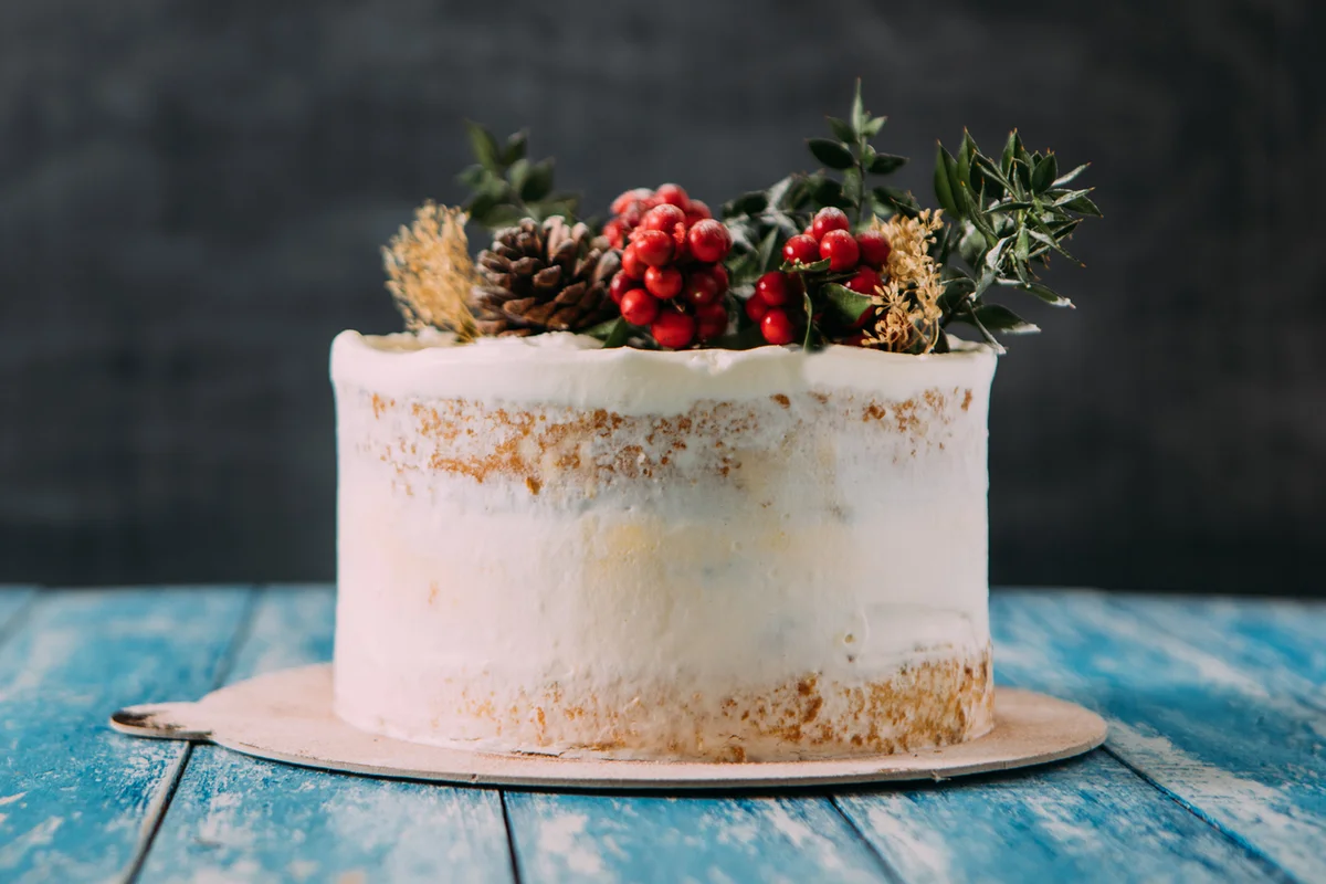 Christmas Cake on rustic wooden table