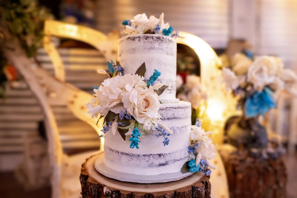 Wedding Cake With Flowers at Wedding Venue