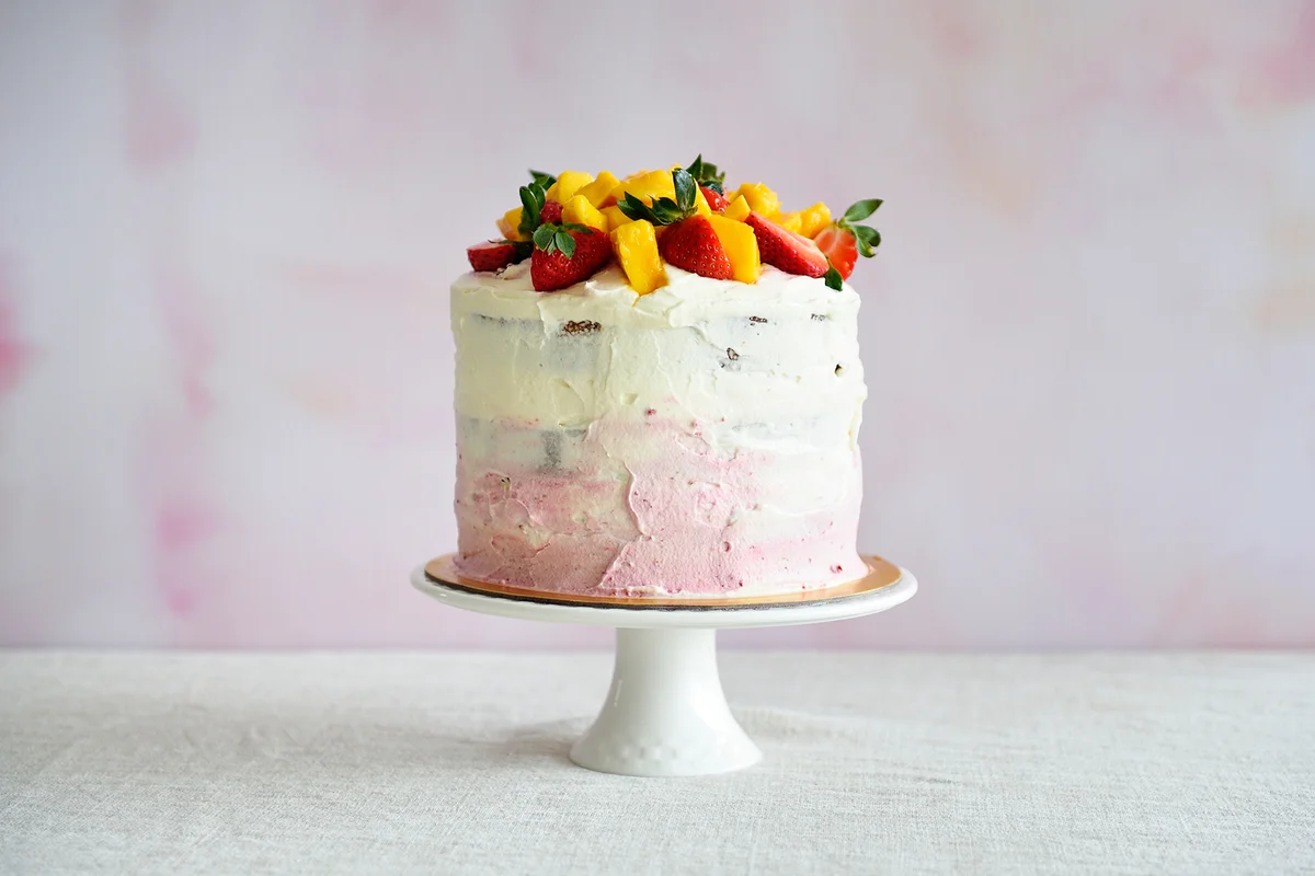 Tall pink and white cake