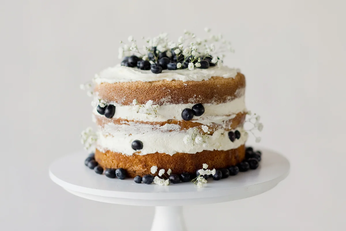 Naked cake with blueberry and cream