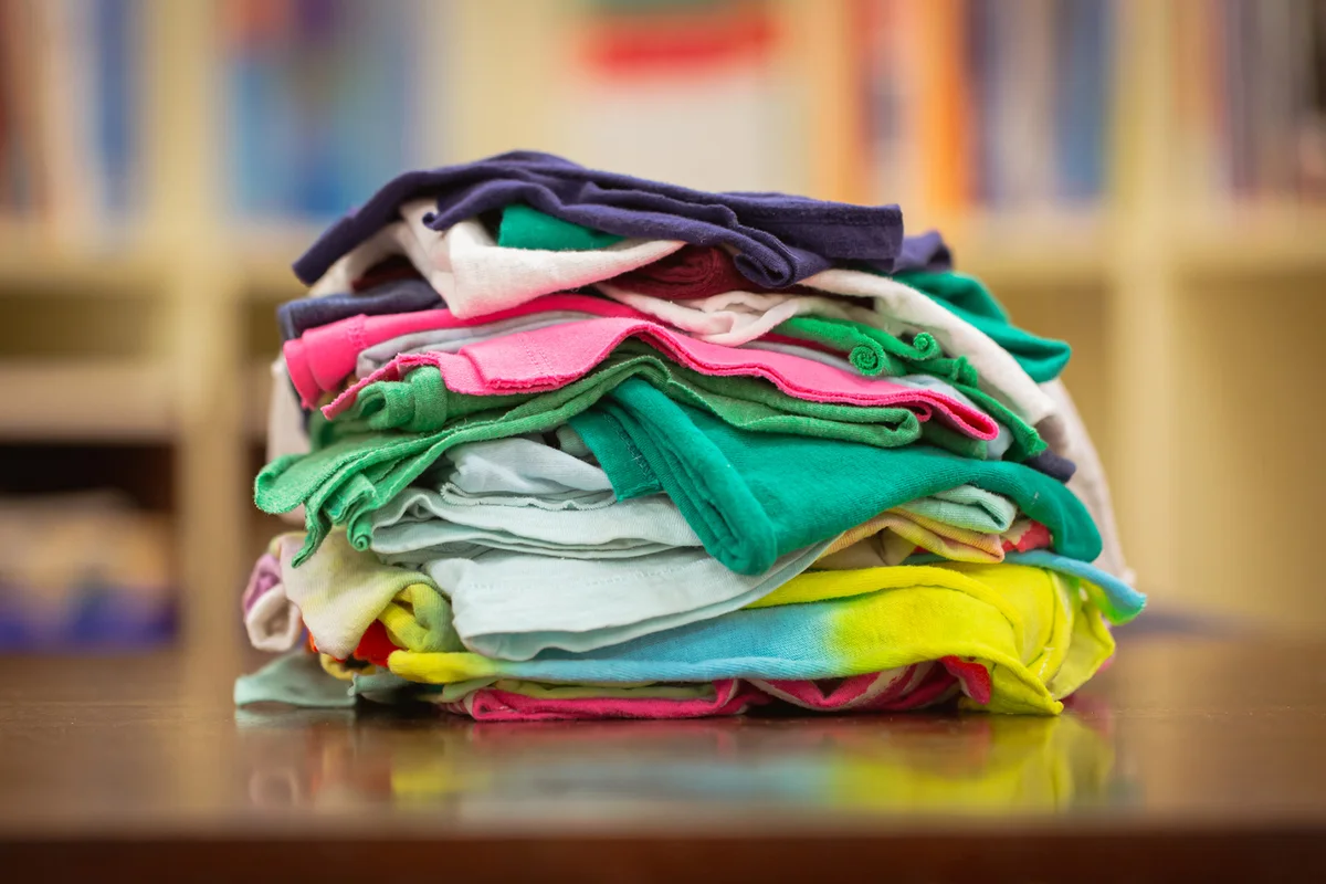 Pile of cleaning cloths made from reused old t-shirt