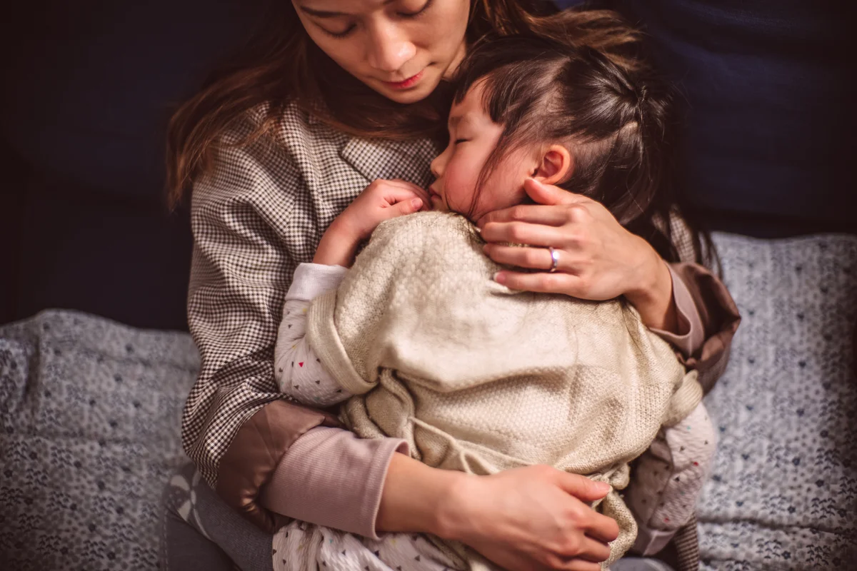 mom napping with toddler