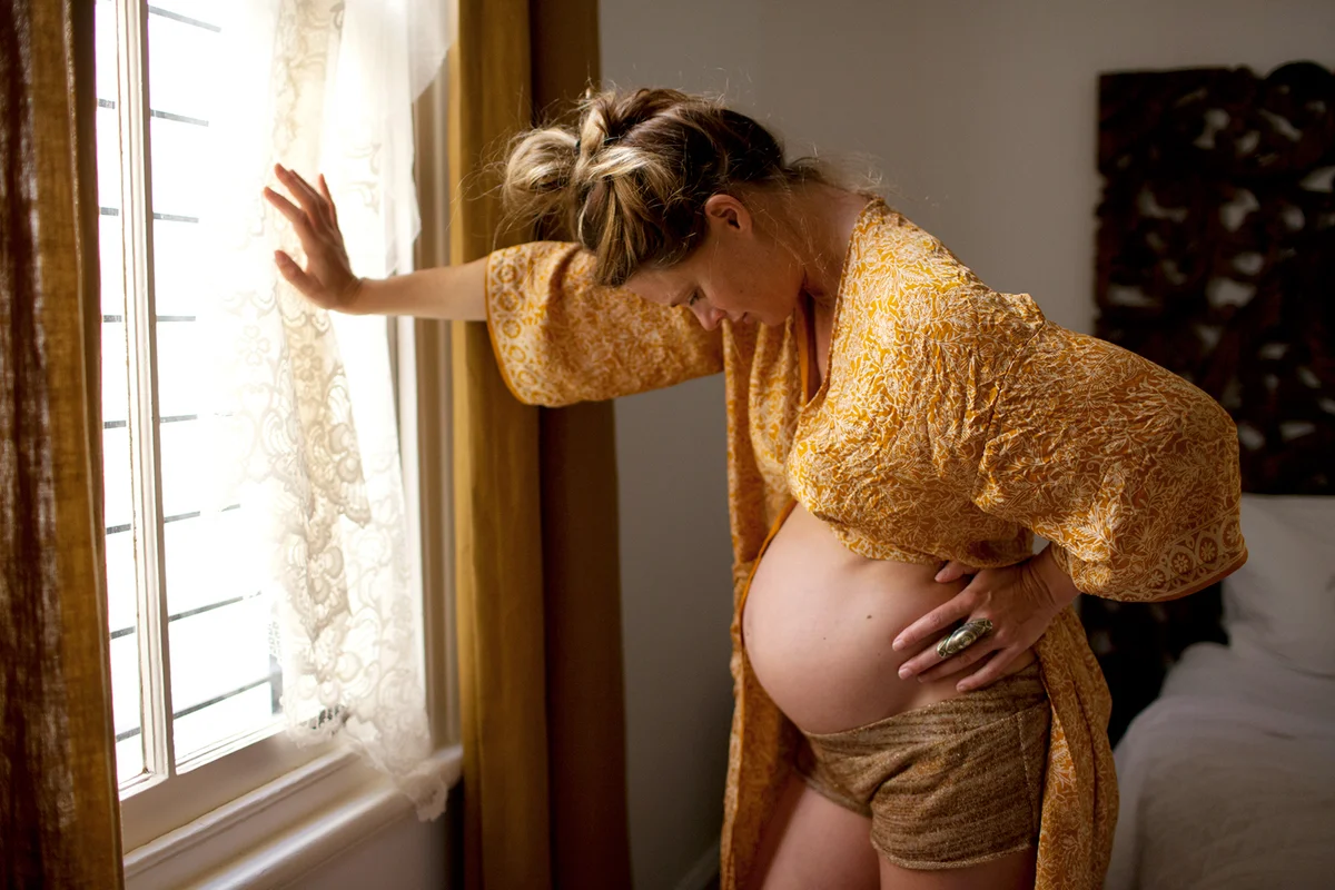 Pregnant woman In labour contractions at home