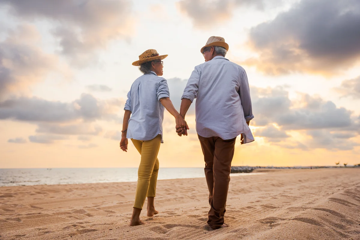 couple walking on a beach