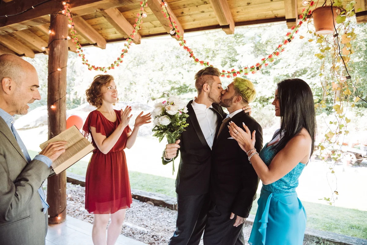 couple sharing a wedding kiss
