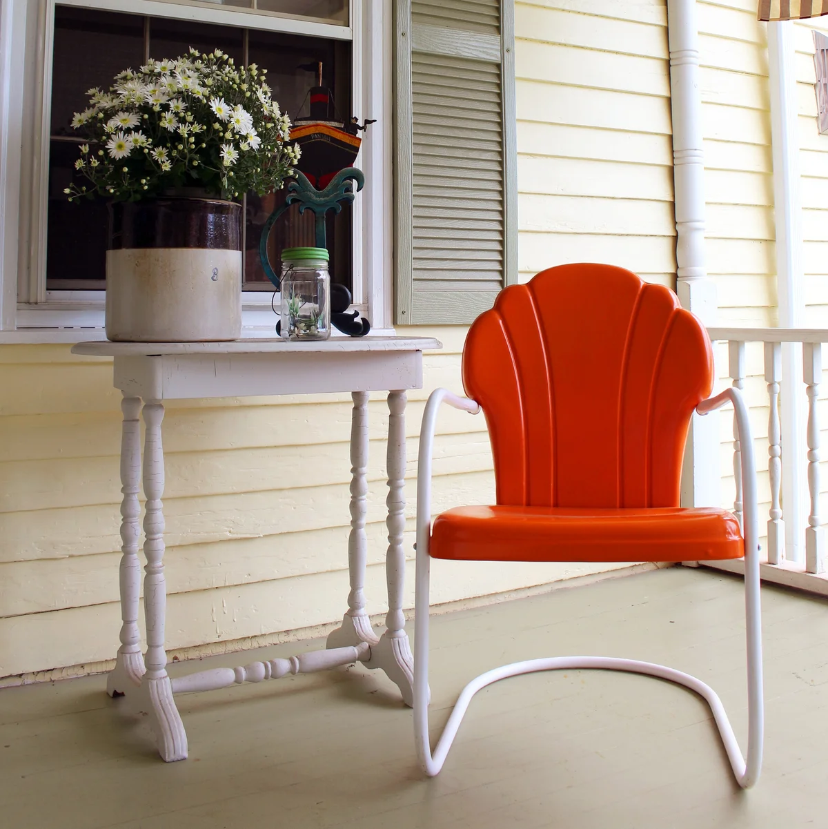Orange chair on porch