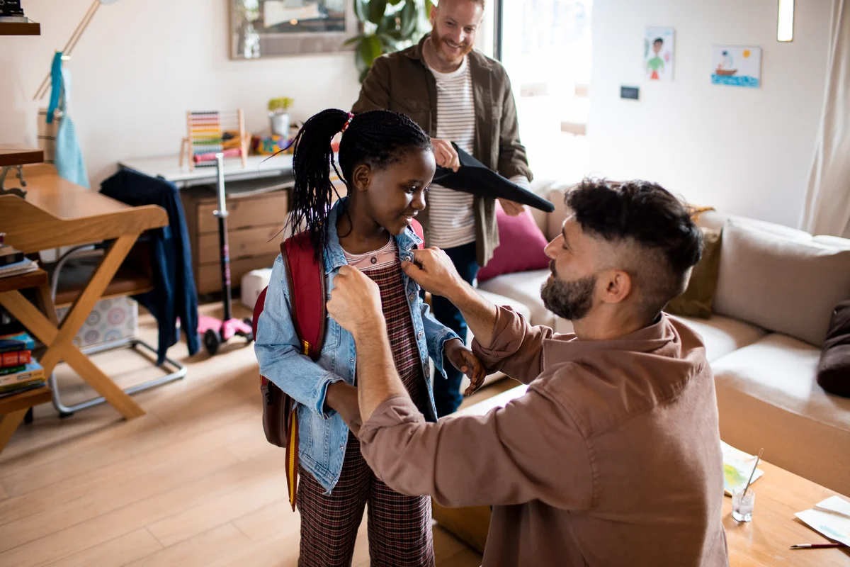 dad and daughter getting ready for school photo