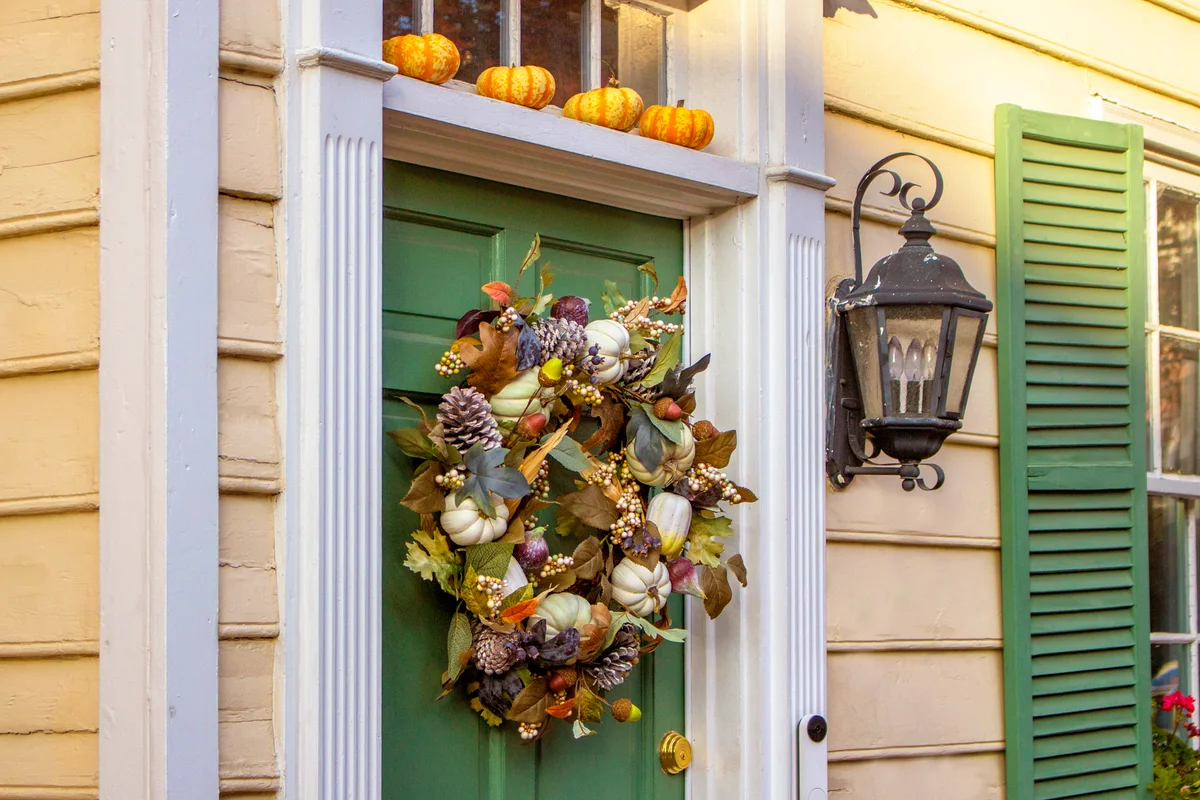 Autumn decorations with a pinecone wreath