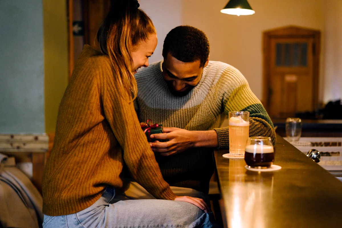 couple laughing during a proposal