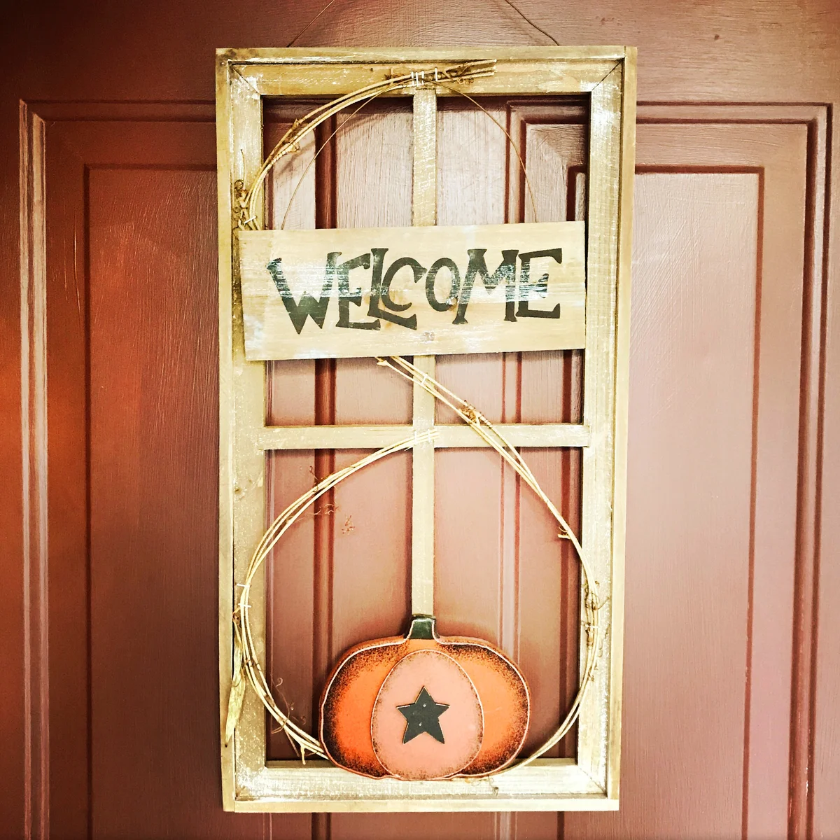 Decorative wooden welcome sign for Halloween