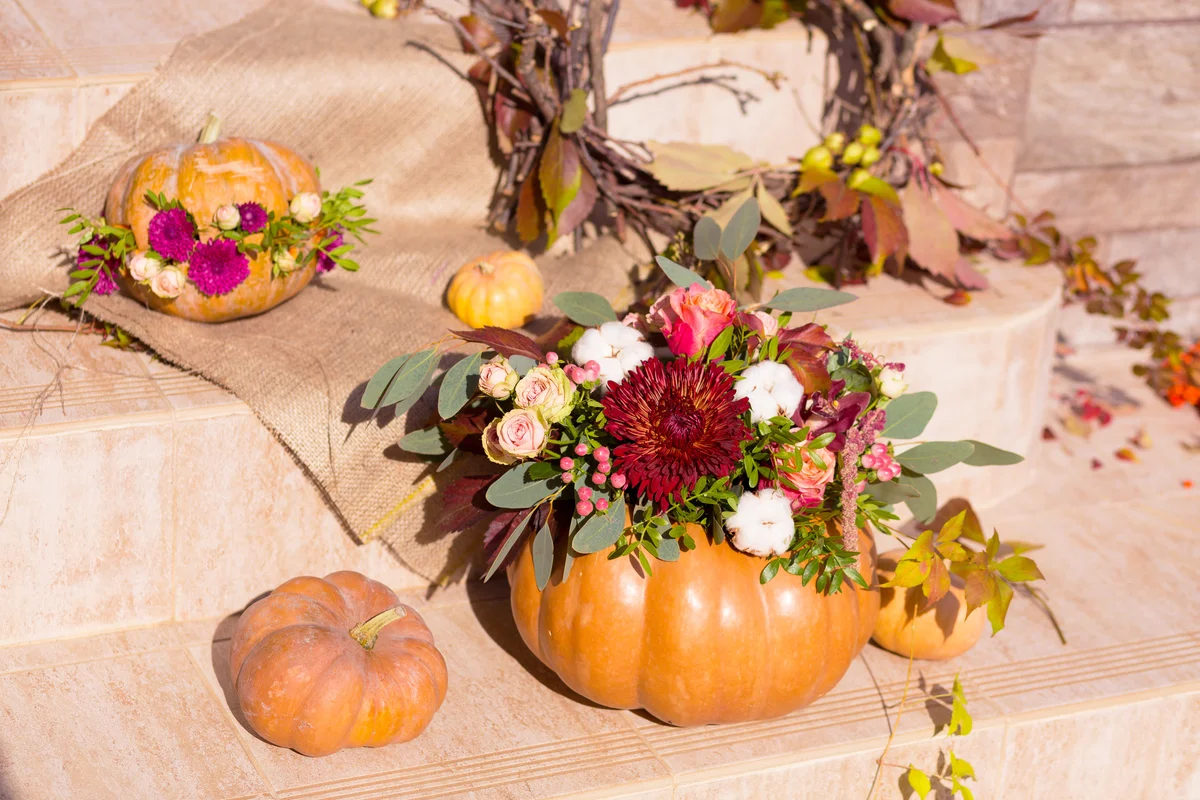Autumn pumpkin and flowers decor