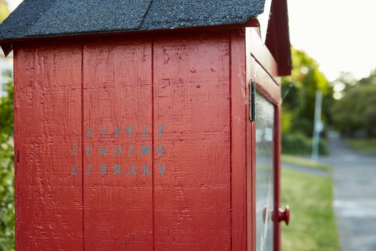 Cute red wood little library