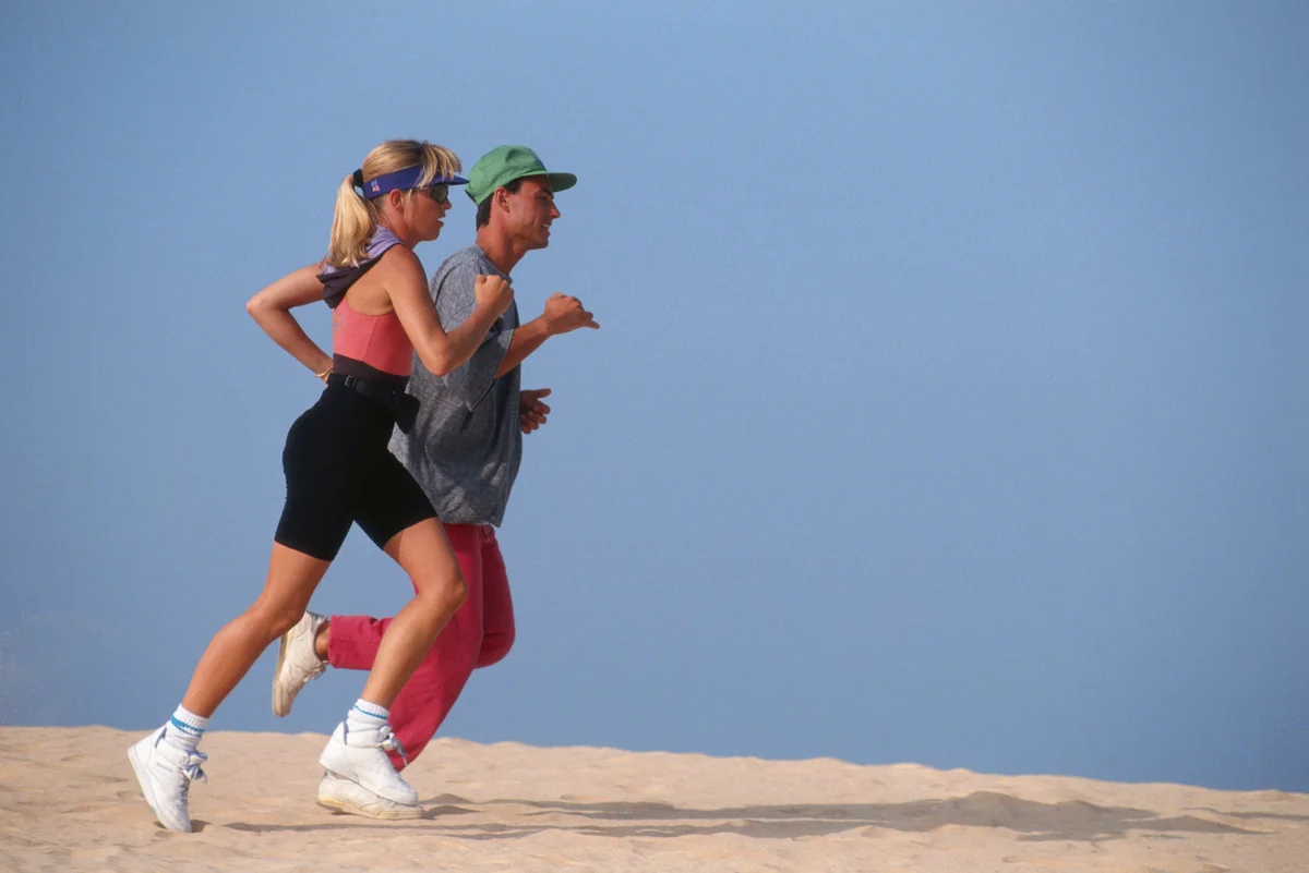 1980s couple jogging