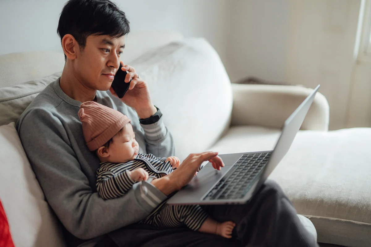father on a laptop