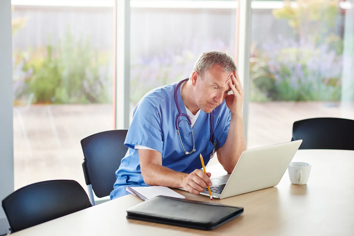 doctor on computer