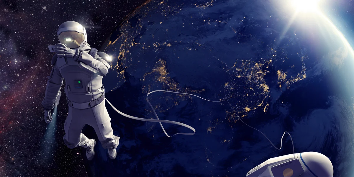 Astronaut in outer space enjoying no gravity
