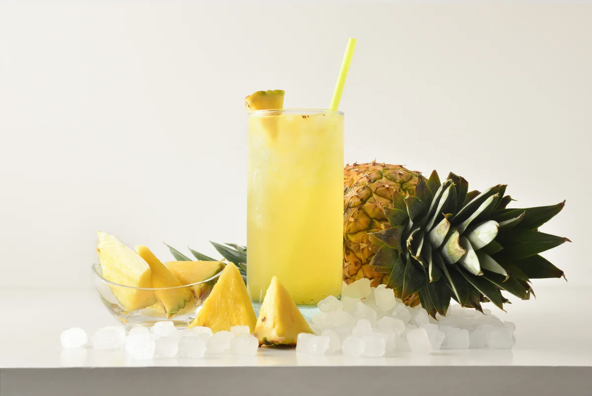 Tall pineapple rum cocktail