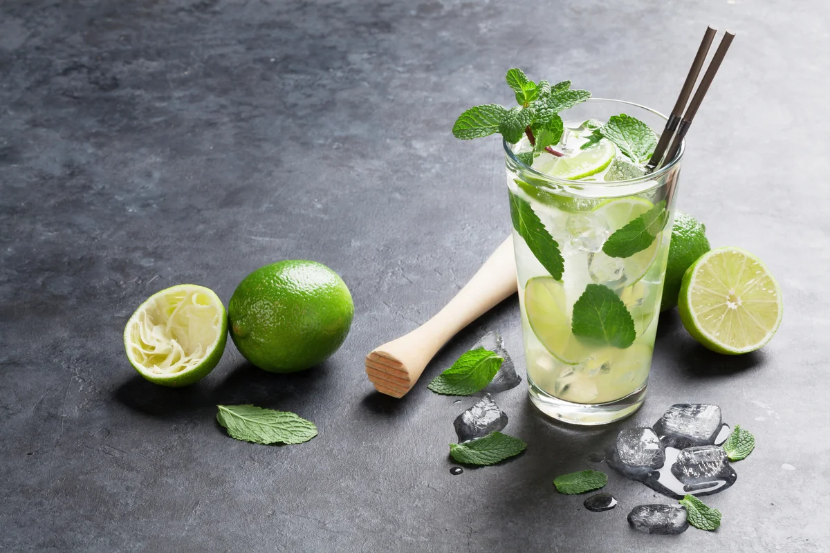 Mojito cocktail with limes and mint