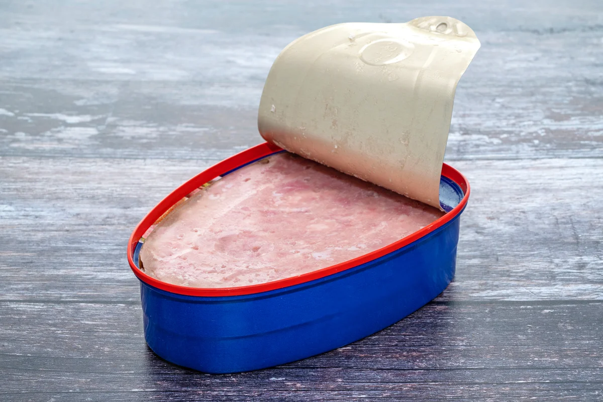 Can of ham on a table surface