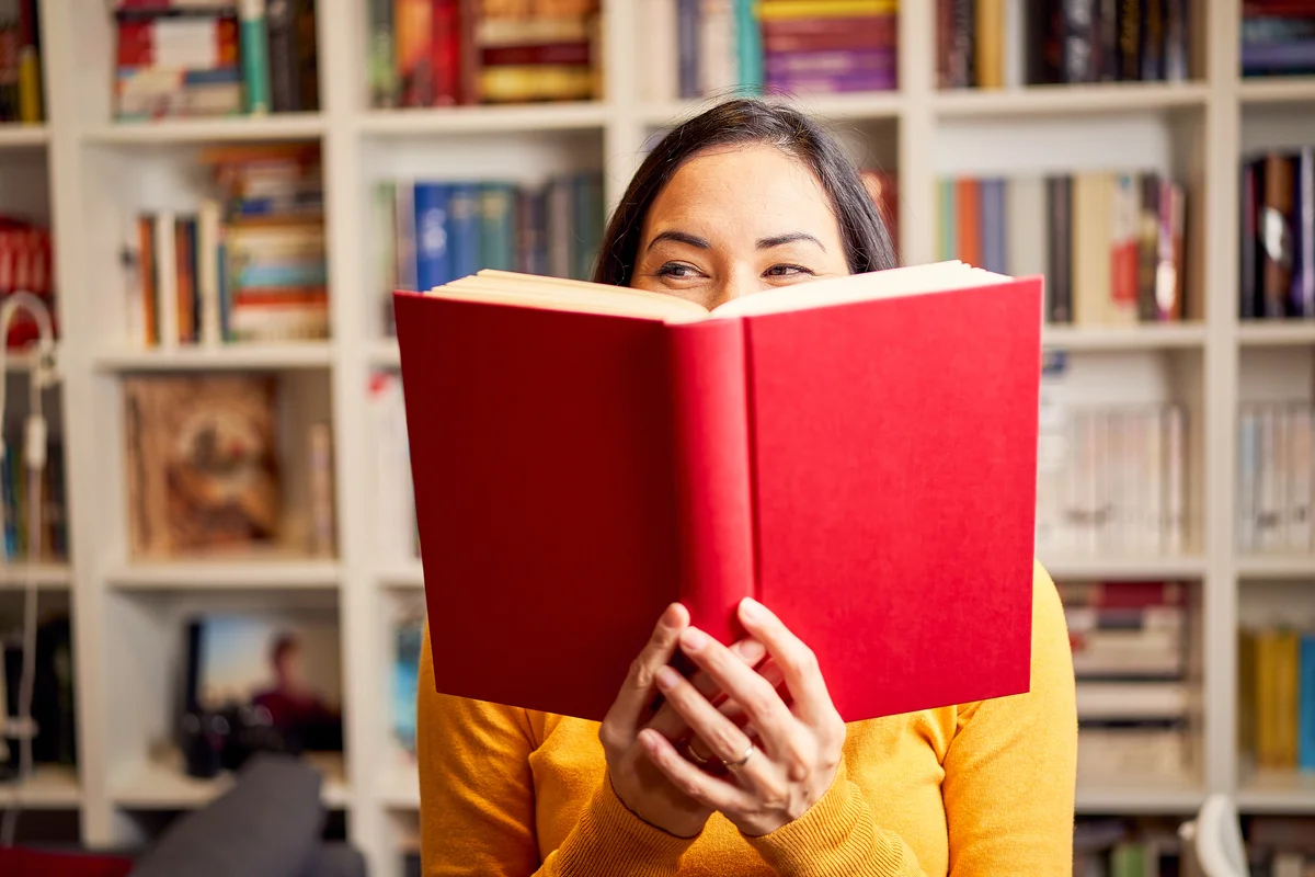Smart woman reading book
