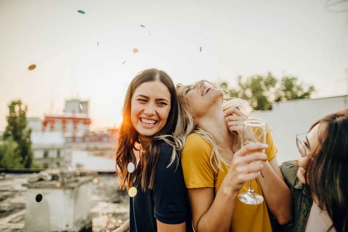 Friends having fun on balcony