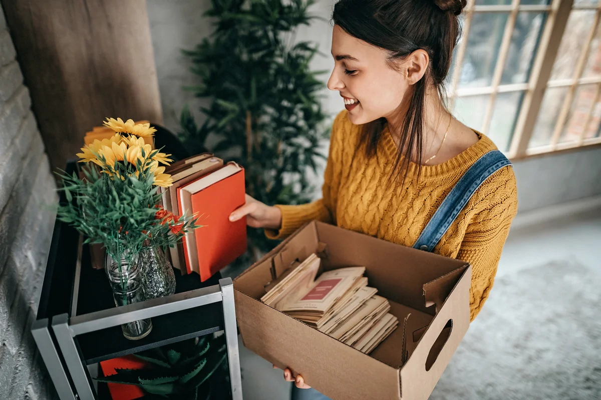 Girl arranging books