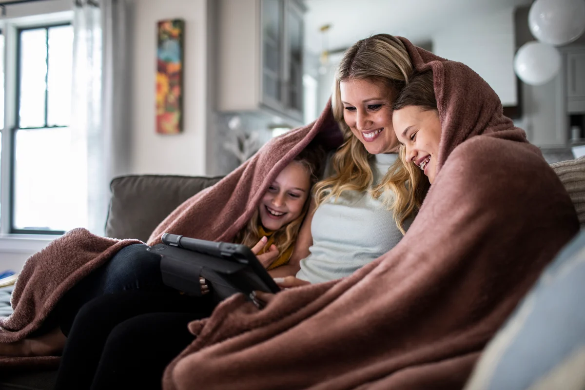 watching a movie under blanket