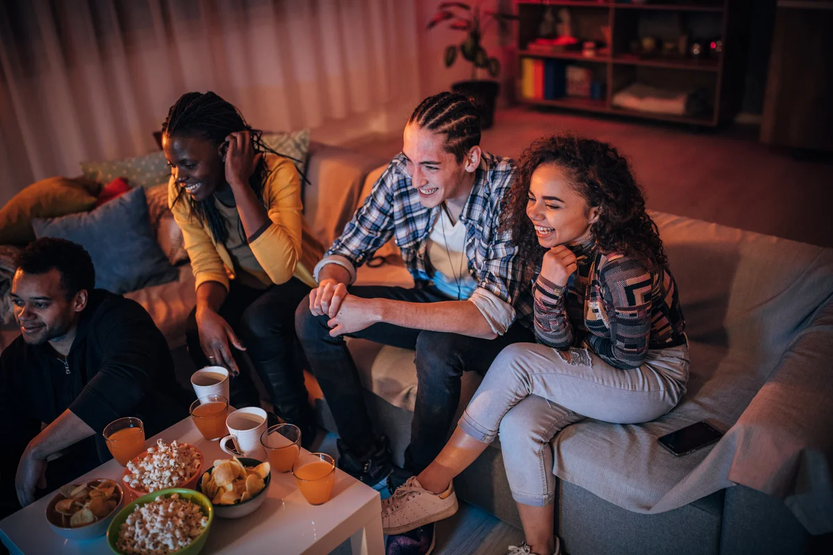 friends watching a movie together