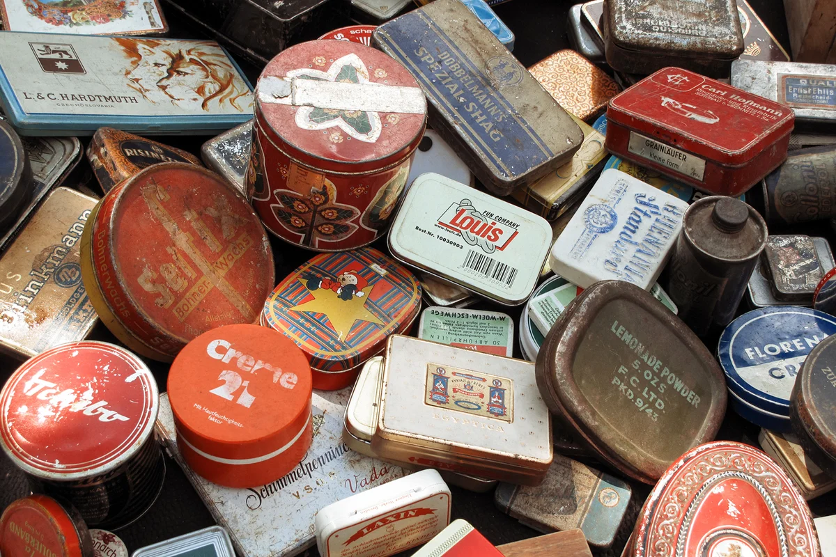Vintage tin boxes for sale in a German flea market
