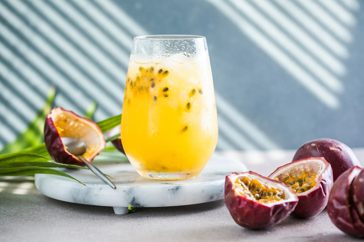 Glass of Iced passion fruit soda with lemon