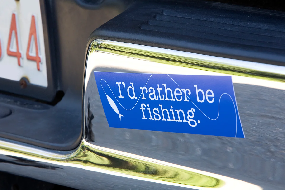 Fishing bumper sticker on car
