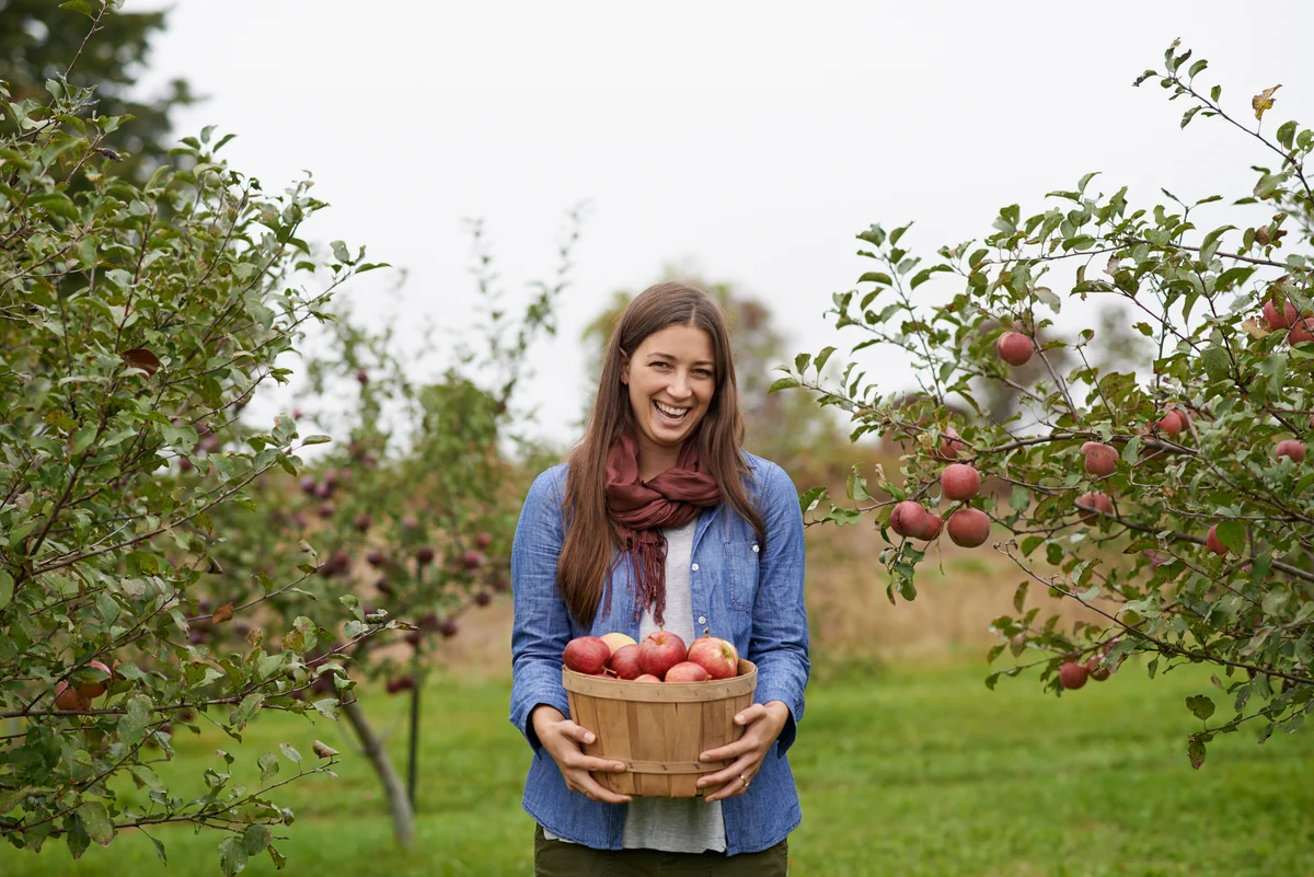 woman picking apples
