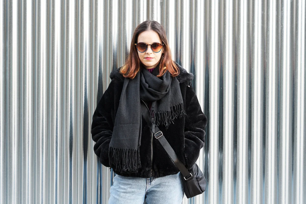 Woman wearing all black for fall