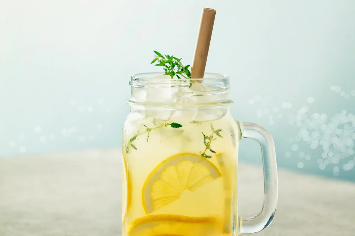Summer drink with lemon and rosemary