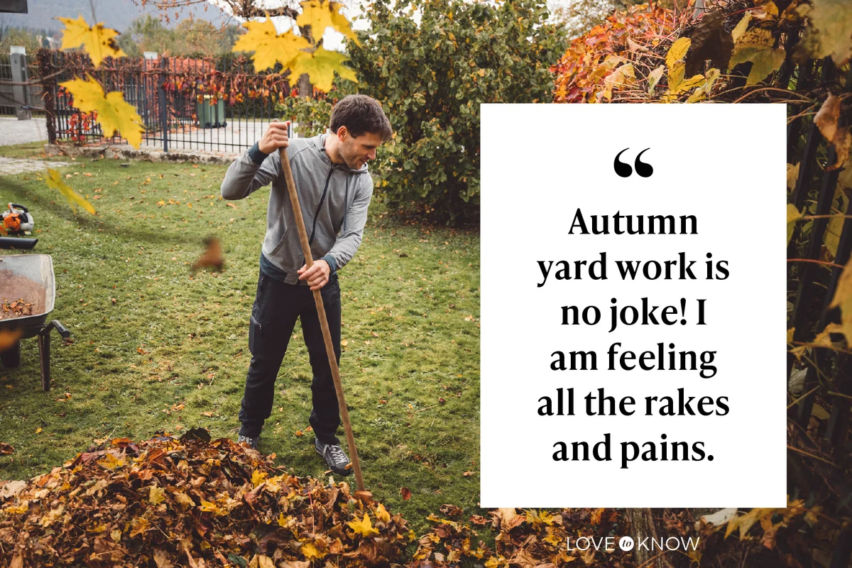 man cleaning his backyard raking fallen autumn leaves