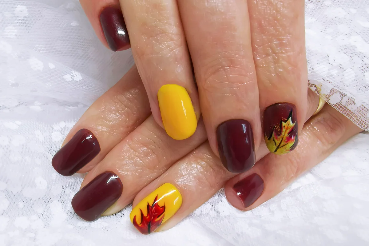 Woman Fingers With Nail Art