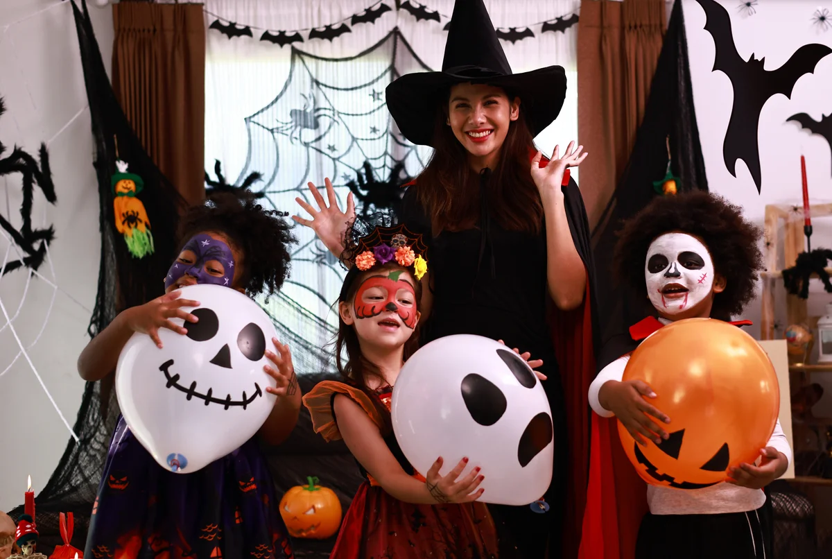 kids wearing Halloween costumes