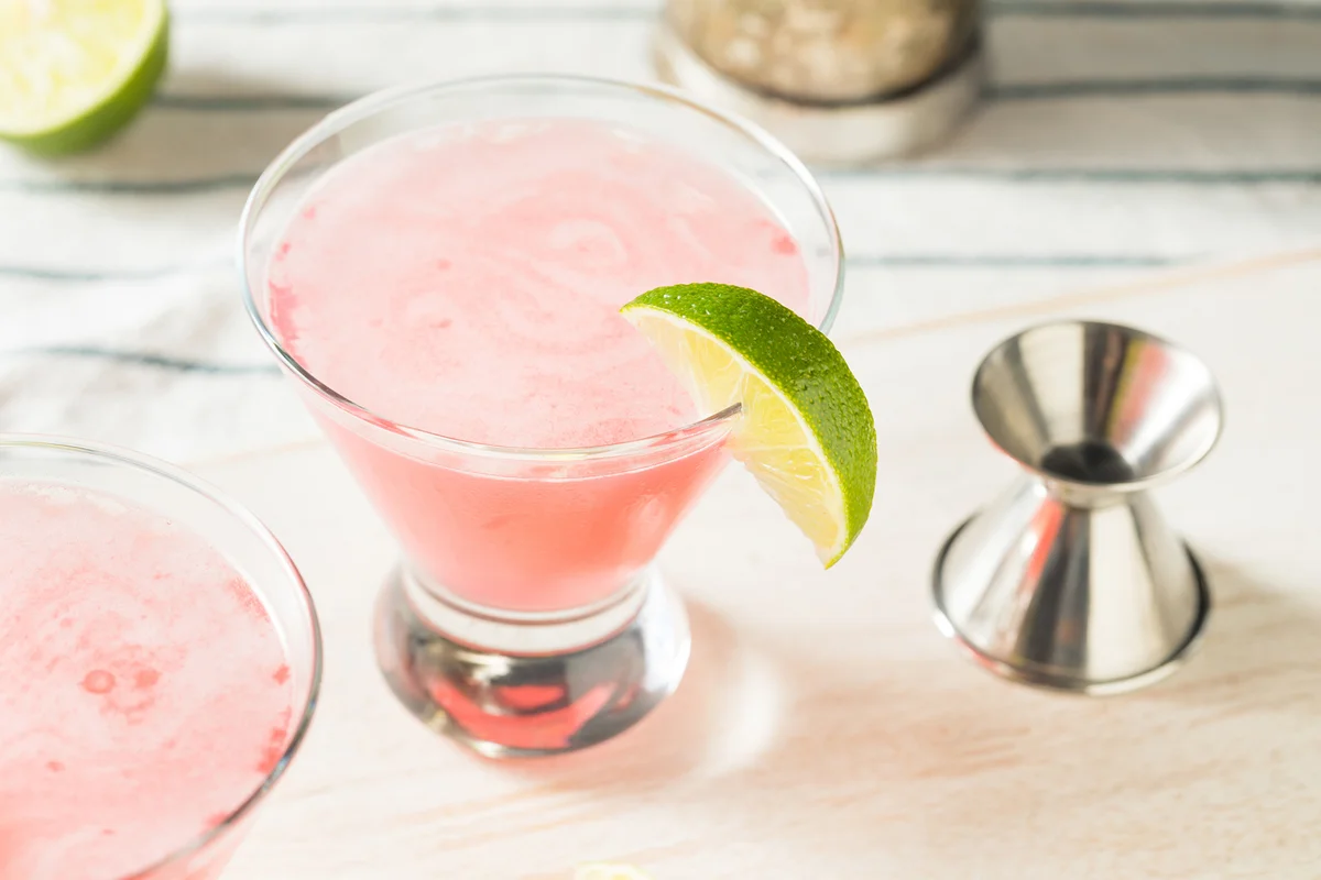 Boozy Refreshing Cranberry Cosmopolitan Cocktail with LIme Garnish
