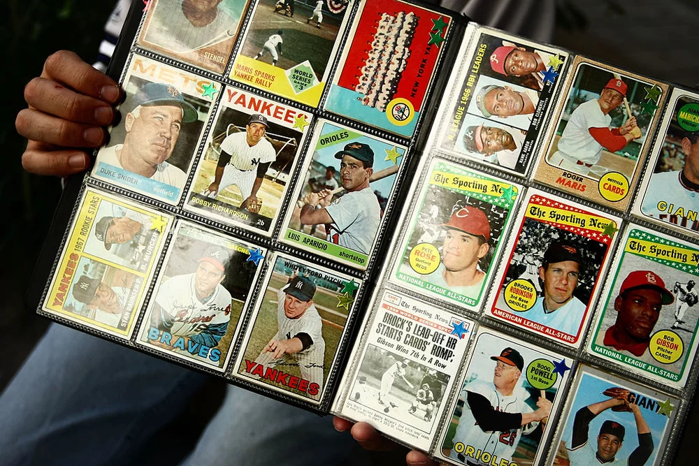 NEW YORK - SEPTEMBER 21: A man sells vintage baseball cards prior to the start of the last game at Yankee Stadium between the Baltimore Orioles and the New York Yankees on September 21, 2008 at Yankee Stadium in the Bronx borough of New York City. Yankee Stadium held it's inaugural game on April 18, 1923 against the Boston Red Sox and tonight's match will be the final game to be played at the historic stadium. During it's 85 years as ''The Home of Champions,'' the stadium has also been known as ''The House that Ruth Built'' and ''The Cathedral.'' The stadium has been host to 33 World Series, three Papal visits and has been visited by legends such as Babe Ruth, Joe DiMaggio, Yogi Bera, Mickey Mantle and boxing great Muhummad Ali. In 2009 the Yankees will move across the street to a newly constructed stadium estimated to cost $1.3 billion.
