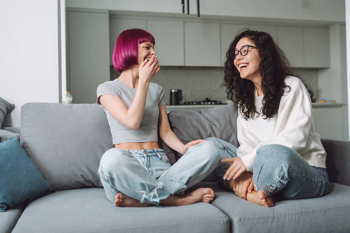 Laughing positive teen girls