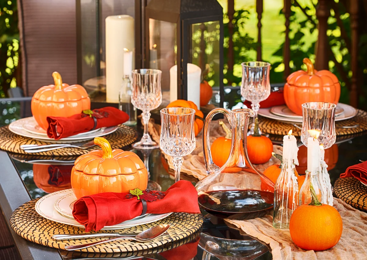 A fall tablescape with pumpkin serving bowls