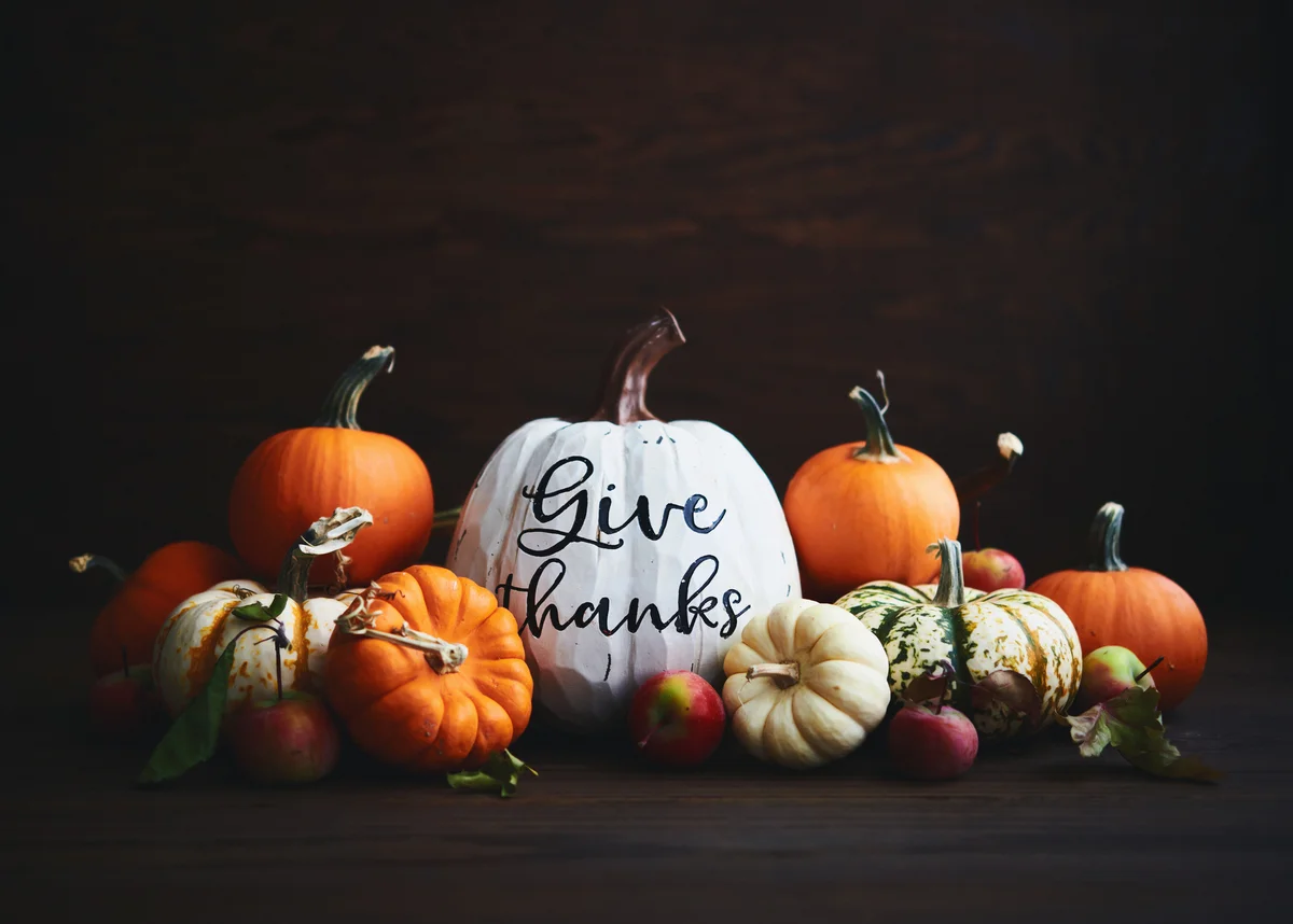 Pile of pumpkins on table