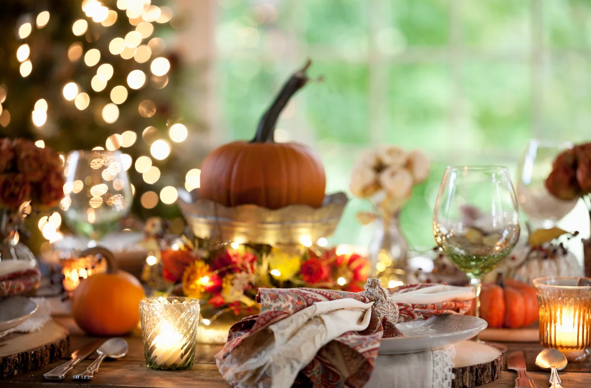 Fall table lit with fairy lights