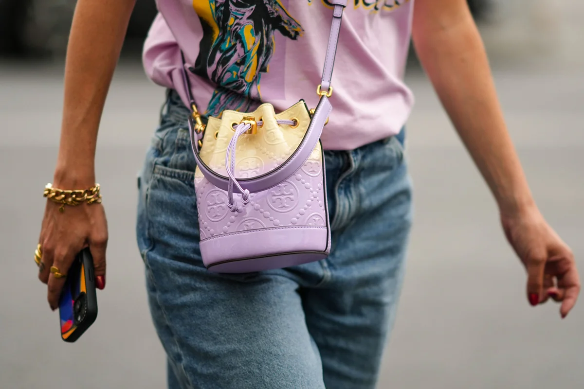 pale purple shiny leather embossed monogram pattern crossbody bag from Tory Burch