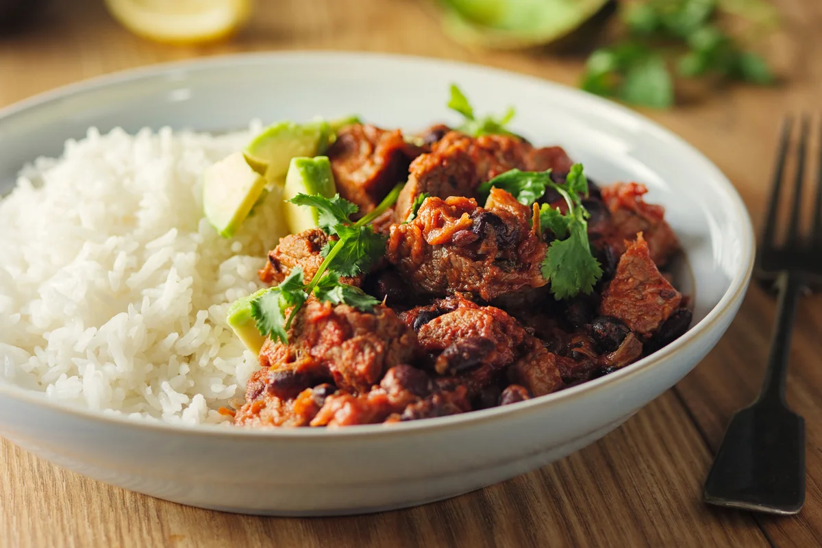 Chilli con carne service with jasmine rice and freshness avocado