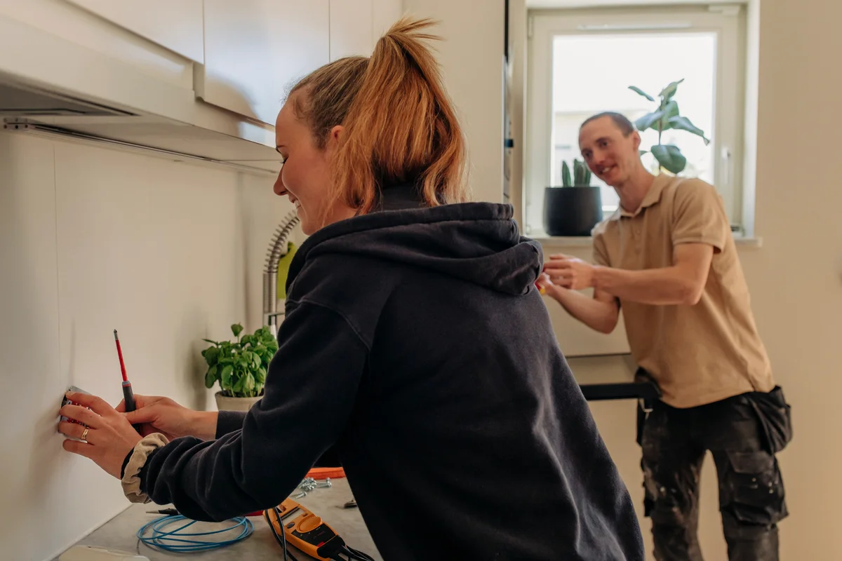 Woman moving an outlet