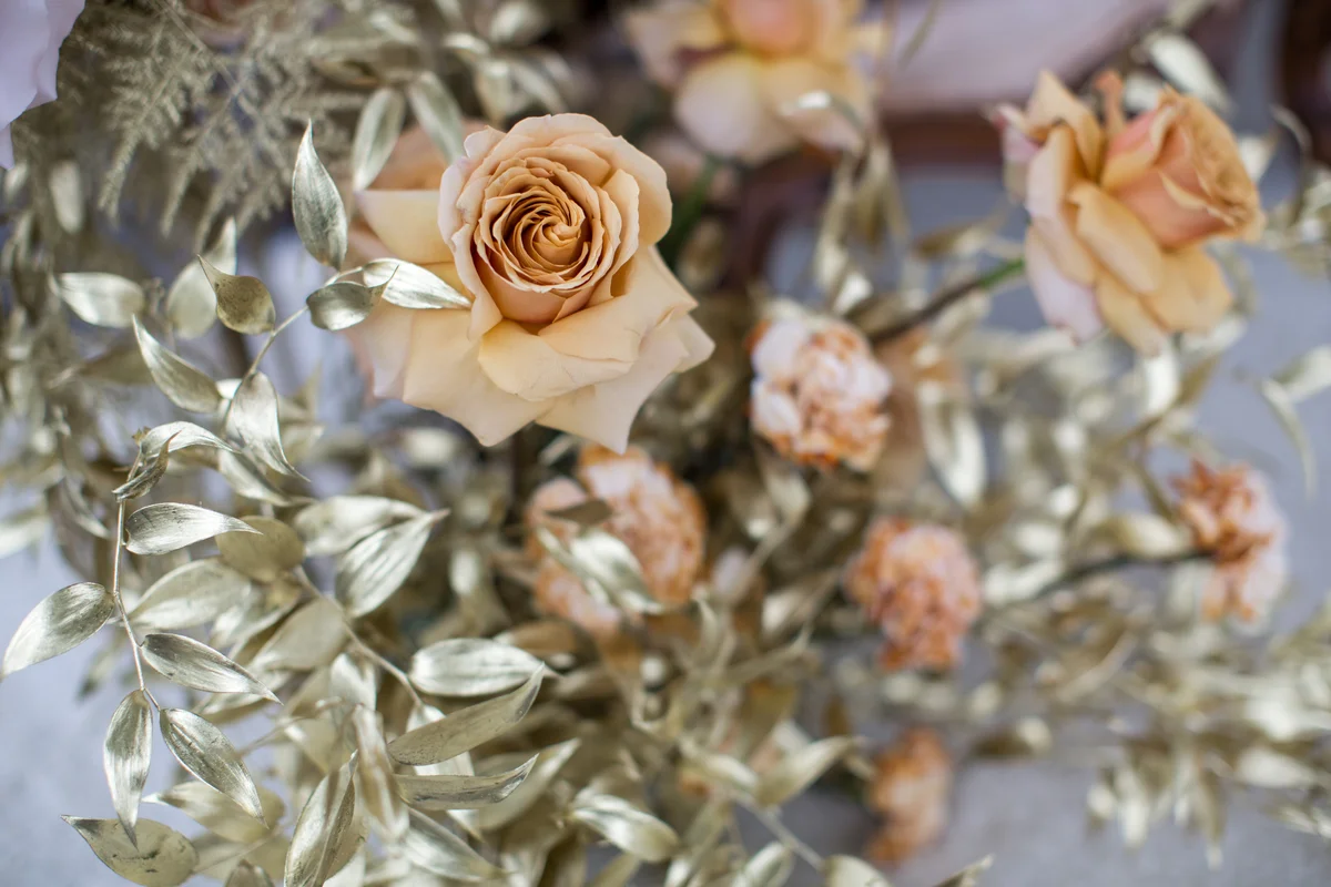 Gold painted wedding florals
