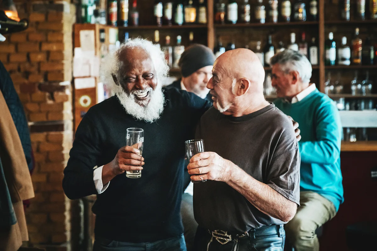 Friends Catching Up At Craft Beer Bar